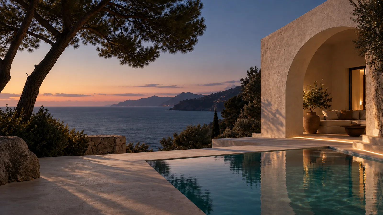 The same imagined coast and private pool at blue hour.